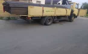 Комплексні послуги: 5т автодоставка довгомірів (до 7м) та завантаження-розвантаження маніпулятором.