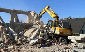 Екскаватор: копання та планування