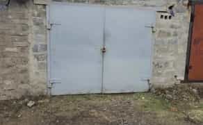 Цегляний гараж у зручному кооперативі