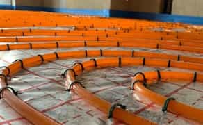 Тепла підлога установка радіаторів тепломереж конвекторів водонагрівачів