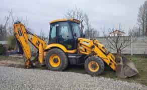 Екскаватор - навантажувач