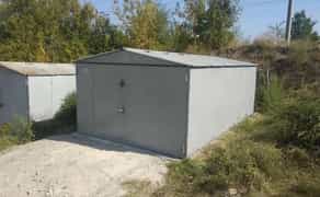 Металевий гараж у кооперативі зі зручним заїздом