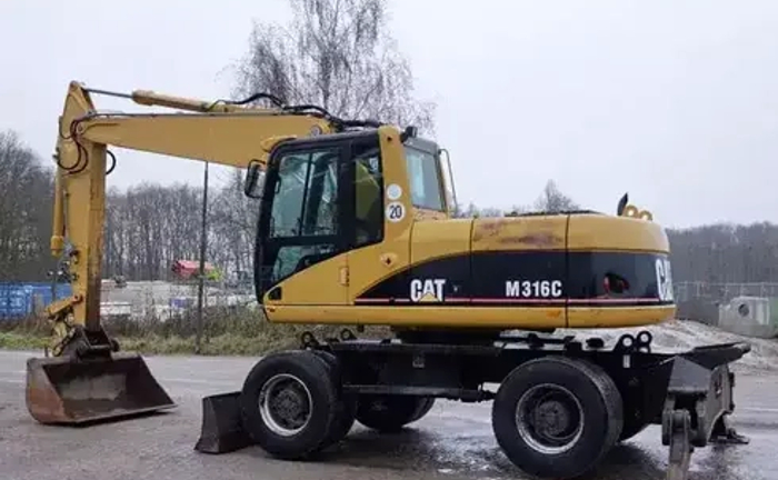 Траншейний-екскаватор на базі Caterpillar M316C Траншейний-екскаватор на базі Caterpillar M316C