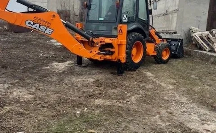 Екскаватор колісний JCB, CASE Екскаватор колісний JCB, CASE