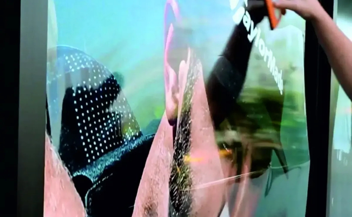 Наклейка вітринного скла. Наклейка плівки на склі. Оформлення вітрин