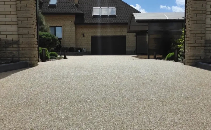 Послуги нанесення покриття кам'яний килим, водопроникне покриття Послуги нанесення покриття кам'яний килим, водопроникне покриття