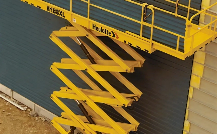 Дизельний ножичний підйомник Haulotte 18SXL