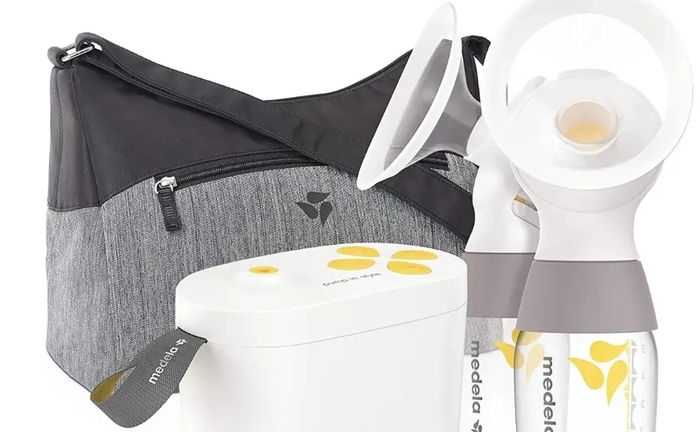 Молоковідсмоктувач Medela MaxFlow . Молоковідсмоктувач Medela MaxFlow .