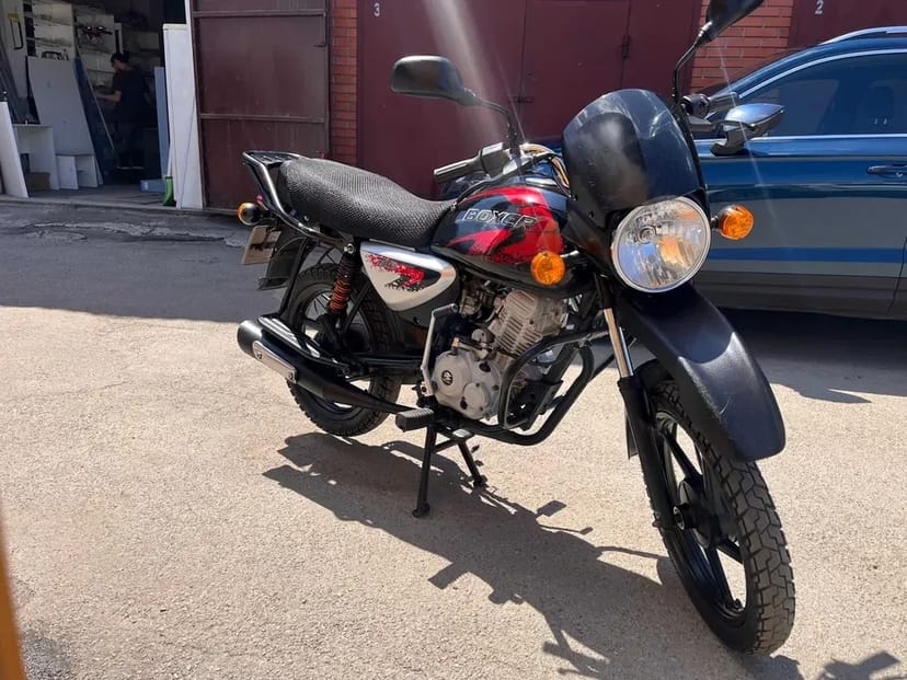 Мотоцикл (скутер) Bajaj Boxer 125/150