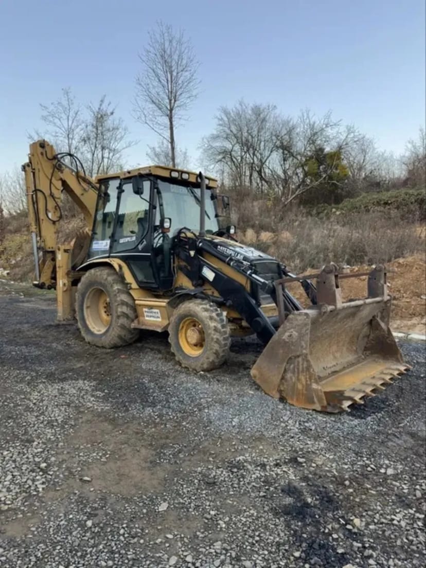 Екскаватор-навантажувач Caterpillar 420E