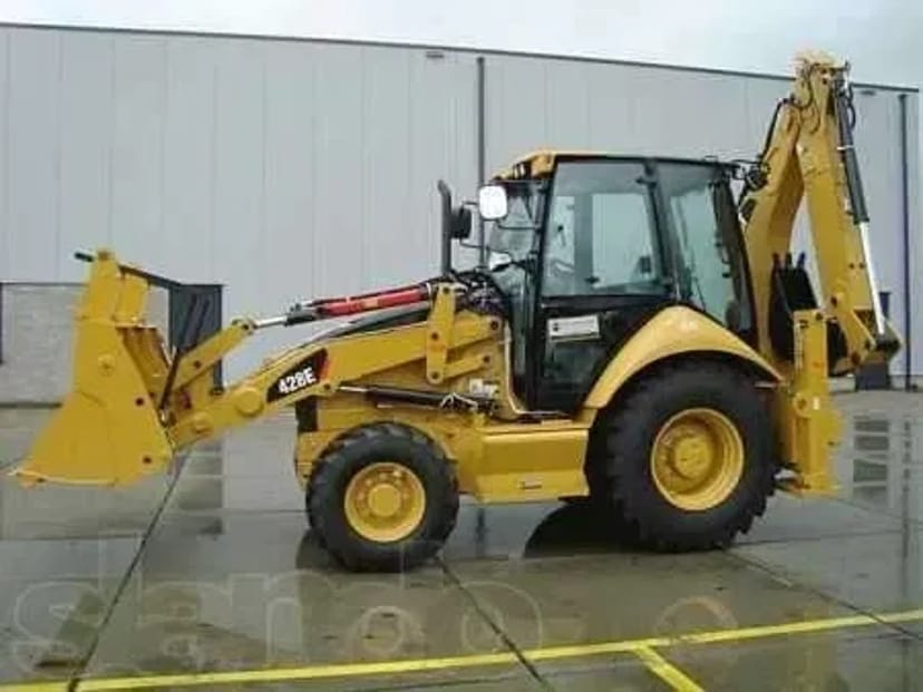 Єкскаватор навантажувач