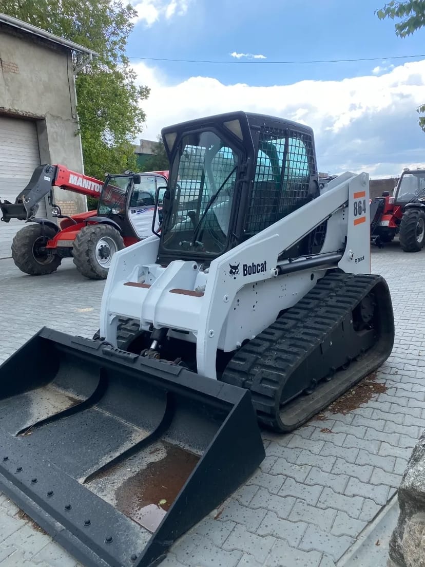 Міні екскаватор та міні навантажувач