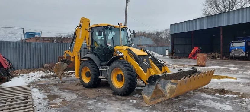 Екскаватор-навантажувач JCB 4CX послуги спецтехніки.