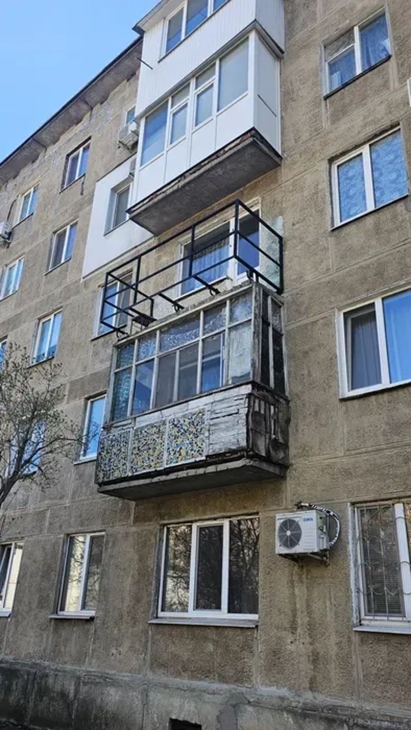 Балкон з розширенням обшивка профлист