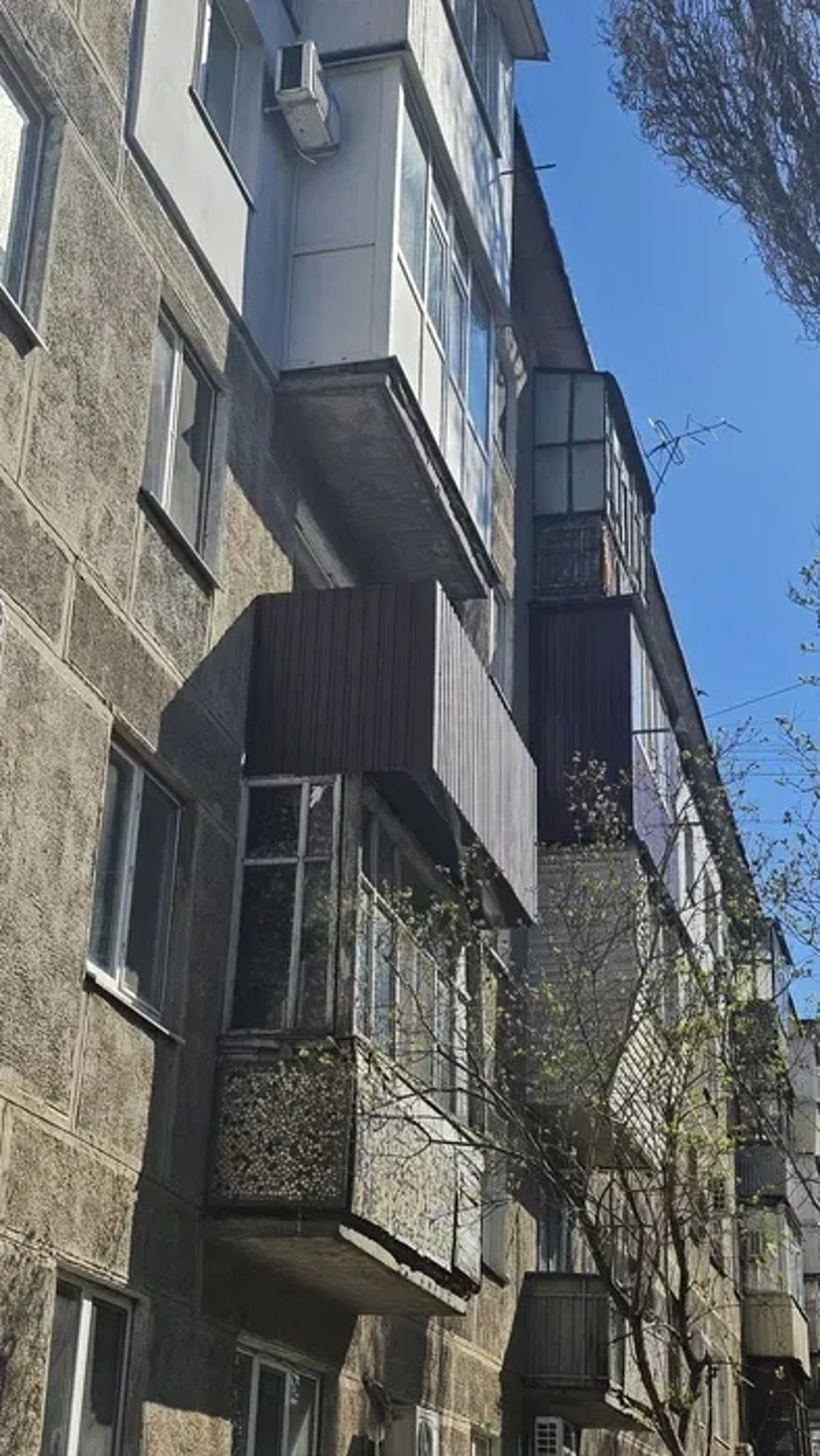 Балкон з розширенням обшивка профлист