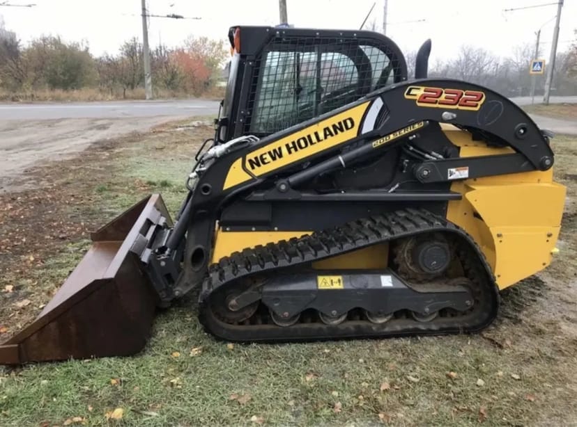 Міні-навантажувач New Holland.