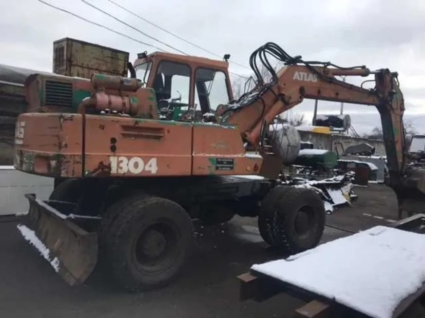 Колісний екскаватор Атлас з об'ємом ковша 0,7 м3