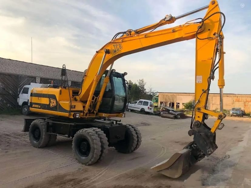 Екскаватор повно поворотнний колісний JCB-145, ківш 1 куб (додатковий планувальний ківш)