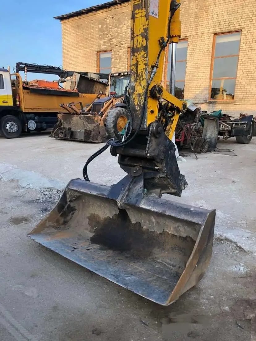 Екскаватор повно поворотнний колісний JCB-145, ківш 1 куб (додатковий планувальний ківш)