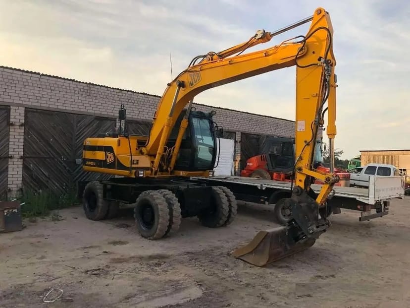 Екскаватор повно поворотнний колісний JCB-145, ківш 1 куб (додатковий планувальний ківш)