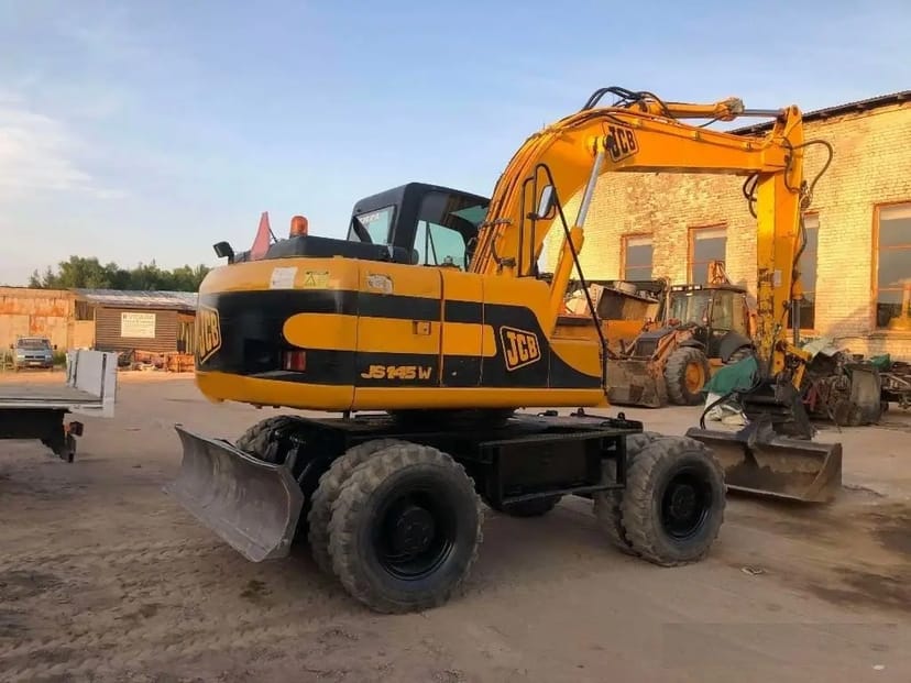 Екскаватор повно поворотнний колісний JCB-145, ківш 1 куб (додатковий планувальний ківш)