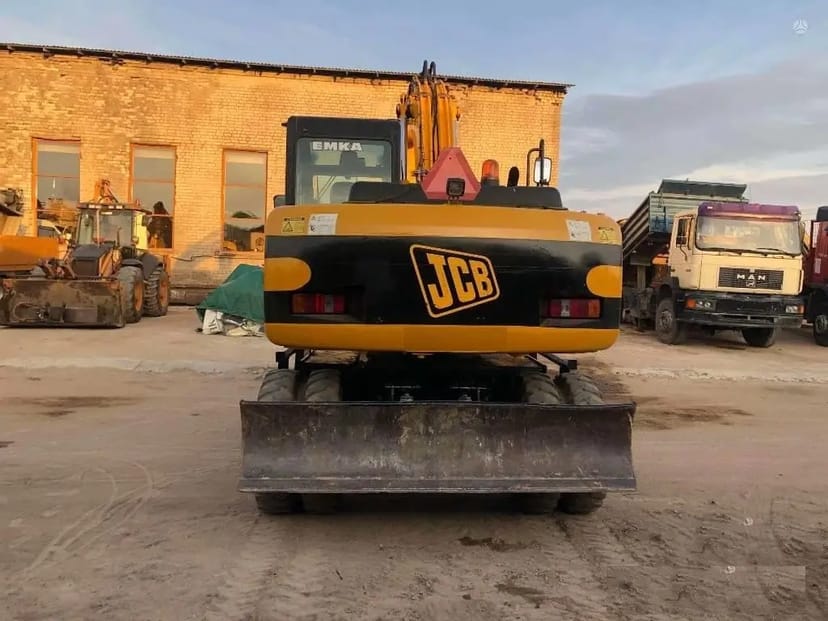 Екскаватор повно поворотнний колісний JCB-145, ківш 1 куб (додатковий планувальний ківш)