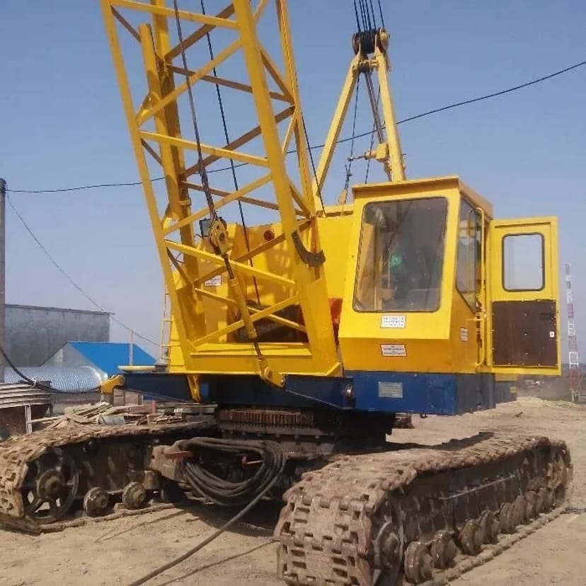 Гусеничний кран МКГ 25 БР