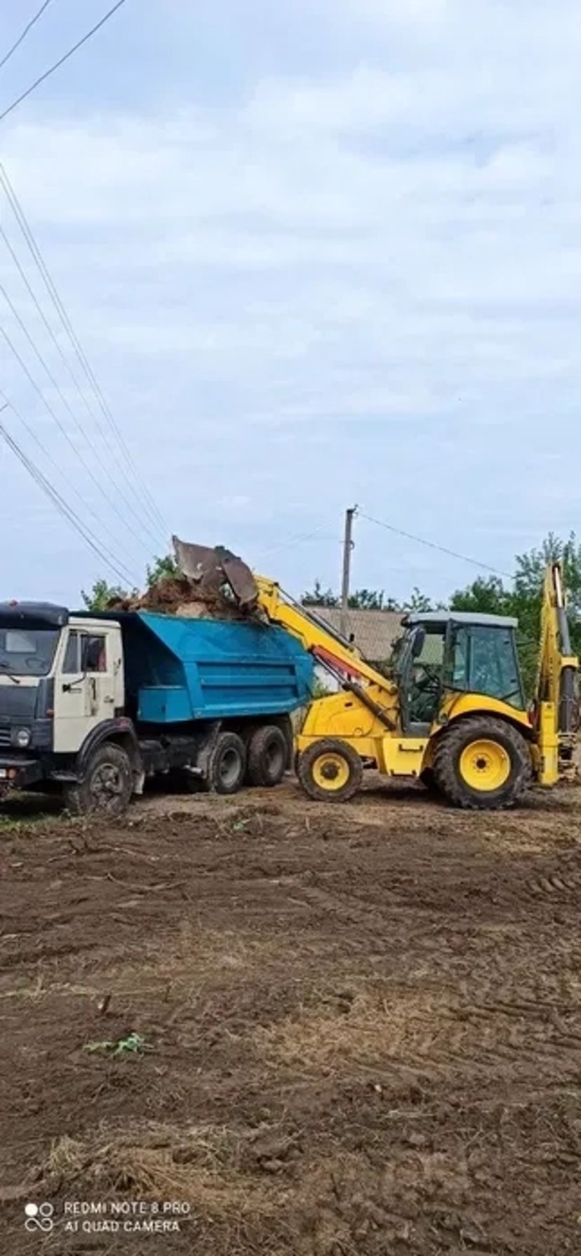 Екскаватор погрузчик