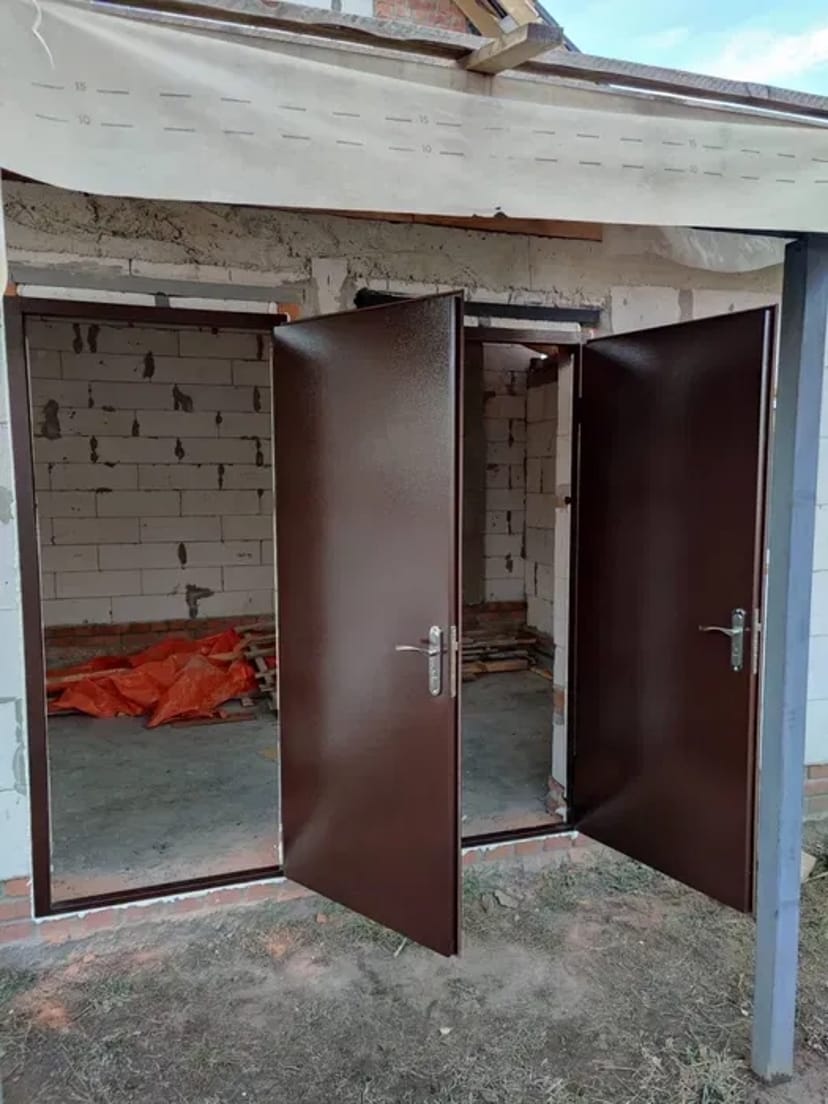 Вхідні металеві двері, ворота, решітки та навіси під замовлення