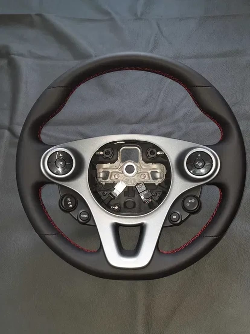 Перетяжка руля и КПП качественными материалами (кожа, алькантара).