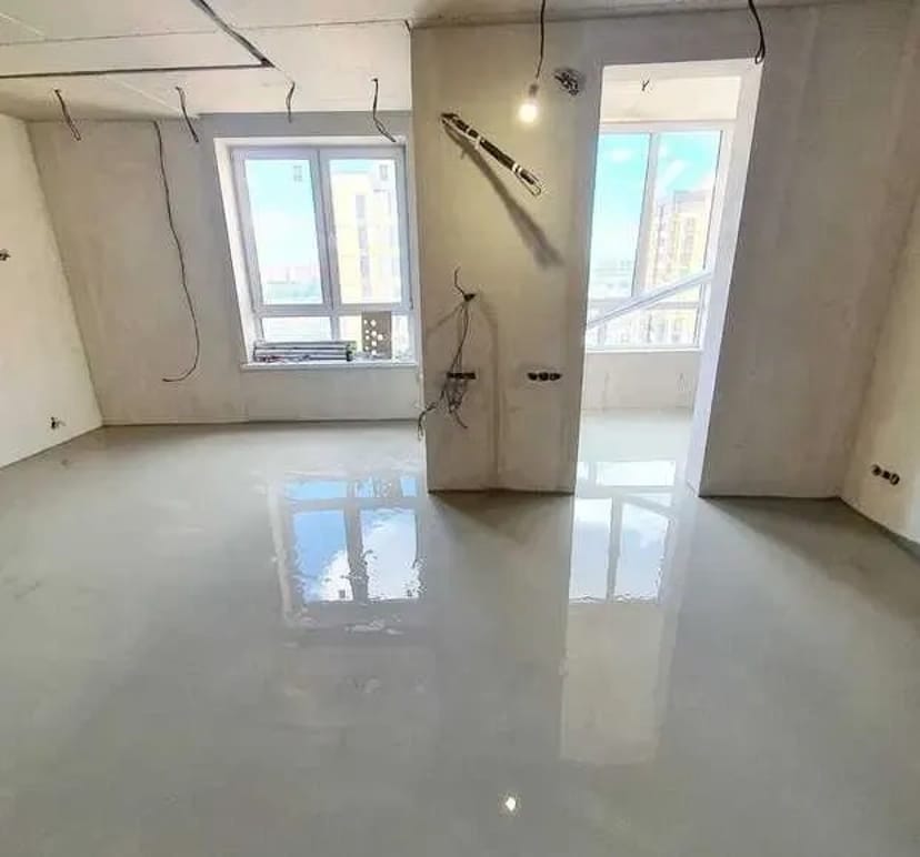 Влаштування стяжки, професійне вирівнювання поверхні та заливка самовирівнювальної наливної підлоги для ідеального результату