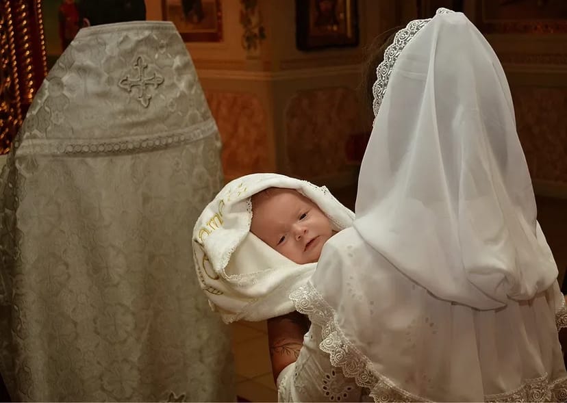 Фотограф на Хрещення. Можливість створення фотокниги.