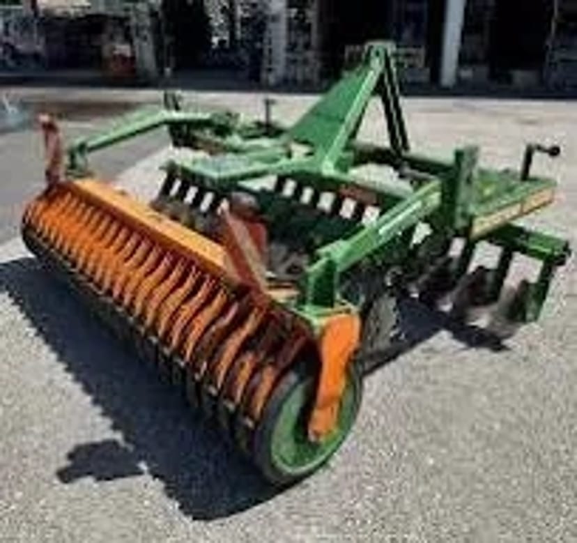 Дискова борона AMAZONE Catros разом із ТРАКТОРОМ колісним John Deere 8370R