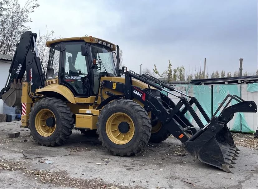 Екскаватор - навантажувач