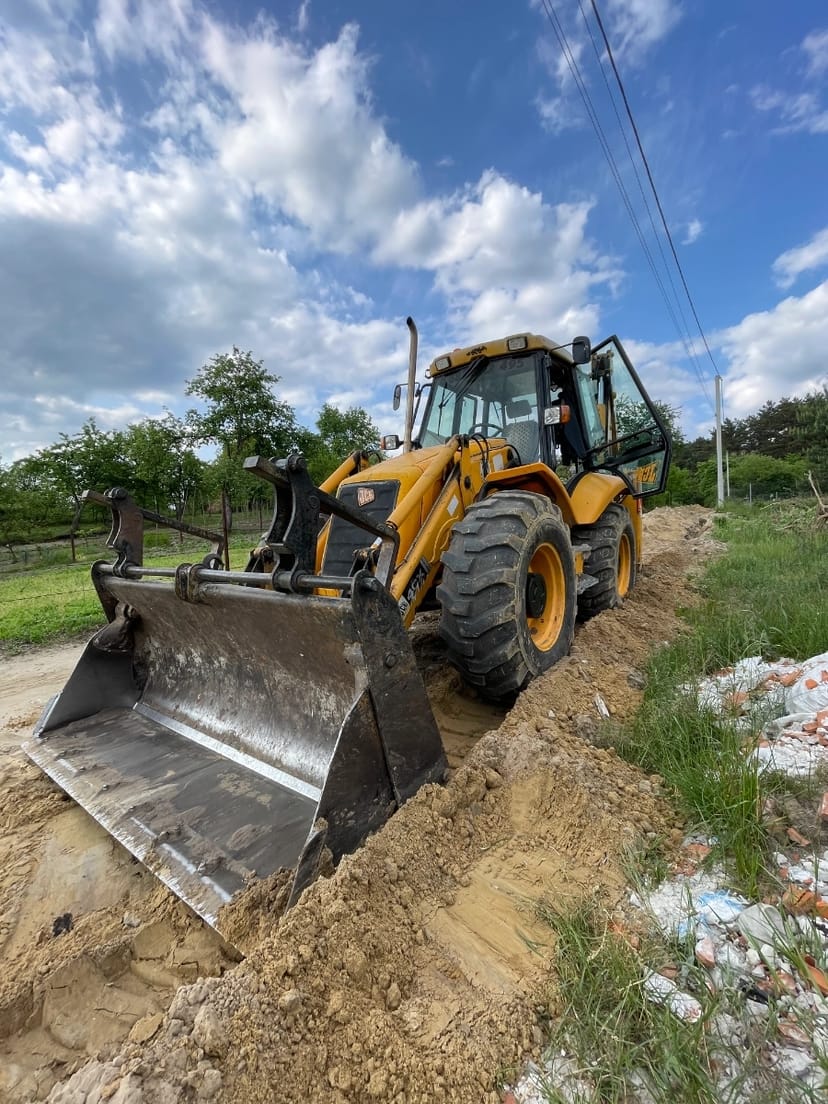 Екскаватор навантажувач
