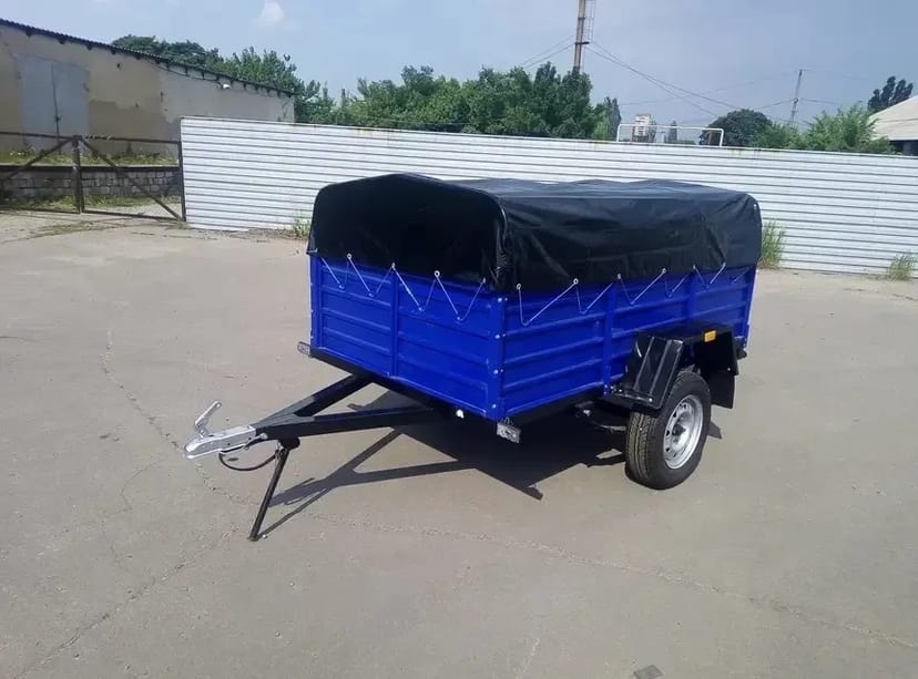 Причеп з тентом та відкривним бортом