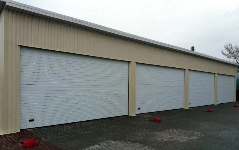 Монтаж секційних, ролетних воріт та автоматики на ворота