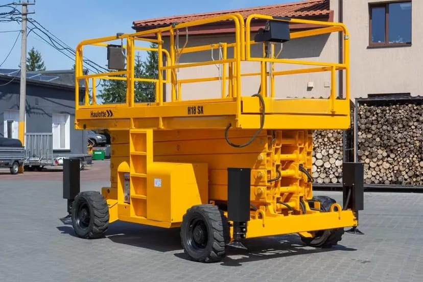 Дизельний підйомник ножиці Haulotte H18SX.