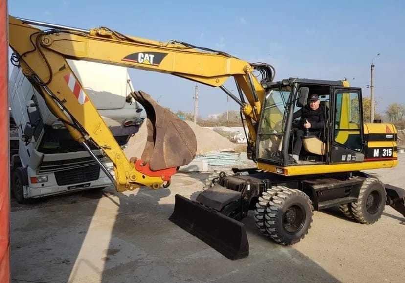 Колісний екскаватор Caterpillar M 315